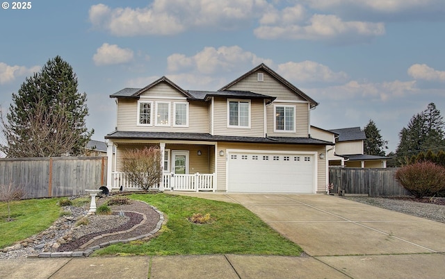 view of front of property with a garage, a front lawn, and covered porch