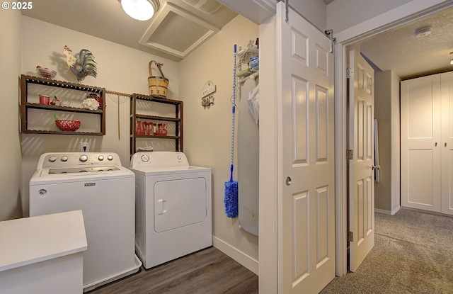 laundry room with washing machine and clothes dryer