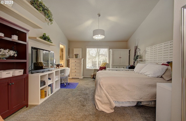 carpeted bedroom featuring vaulted ceiling