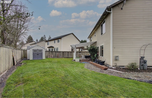 view of yard featuring a storage unit and a pergola