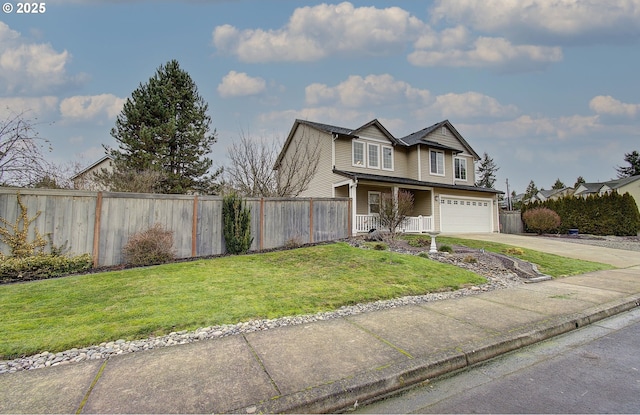 view of front of home featuring a garage and a front yard