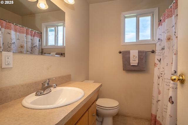 164 Pippin Ave, Roseburg, OR 97471 - full bathroom with toilet, vanity, tile patterned floors, and curtained shower