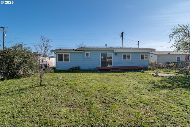 164 Pippin Ave, Roseburg, OR 97471 - rear view of property with a wooden deck, a yard, and fence
