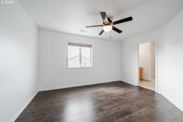 5700 NE 82nd Ave Unit C15, Vancouver, WA 98662 - empty room with dark wood finished floors, baseboards, ceiling fan, and visible vents