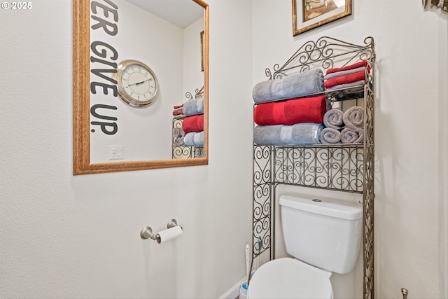 half bathroom with toilet