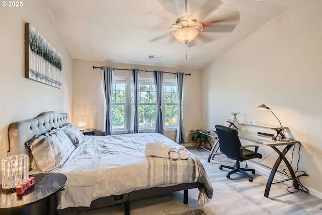 bedroom featuring ceiling fan and lofted ceiling