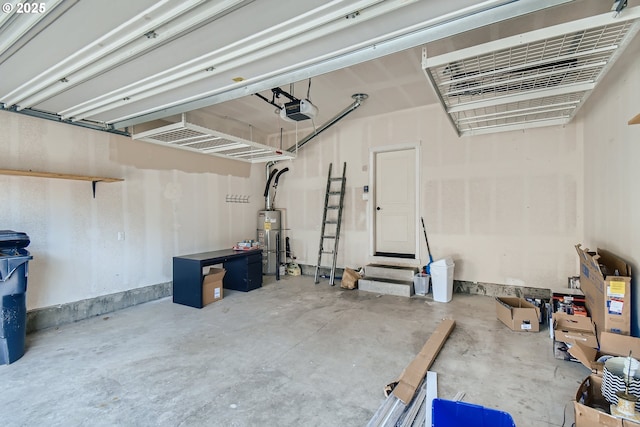 garage featuring a garage door opener and gas water heater