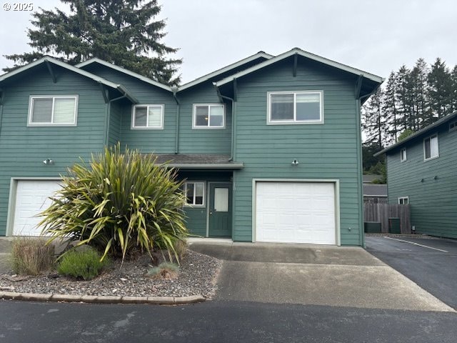 815 Old County Rd Unit 15, Brookings, OR 97415 - view of front of property featuring an attached garage and asphalt driveway