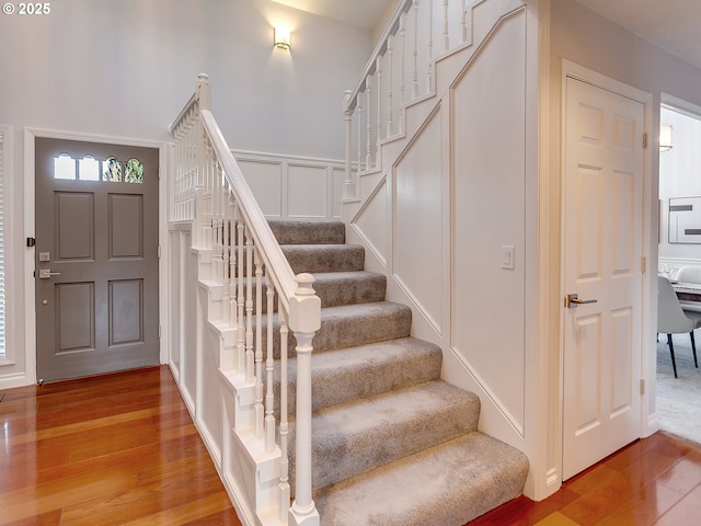 foyer entrance with hardwood / wood-style floors