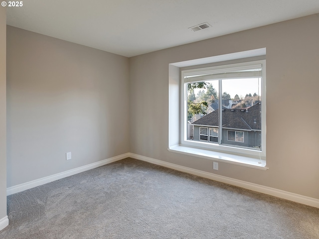 view of carpeted spare room