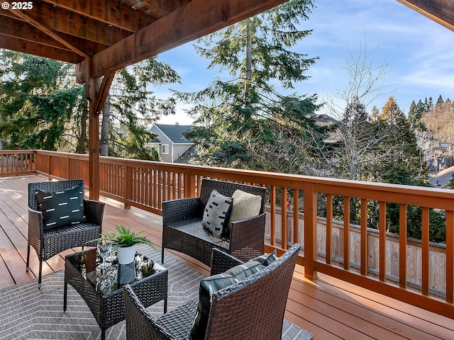 deck featuring outdoor lounge area