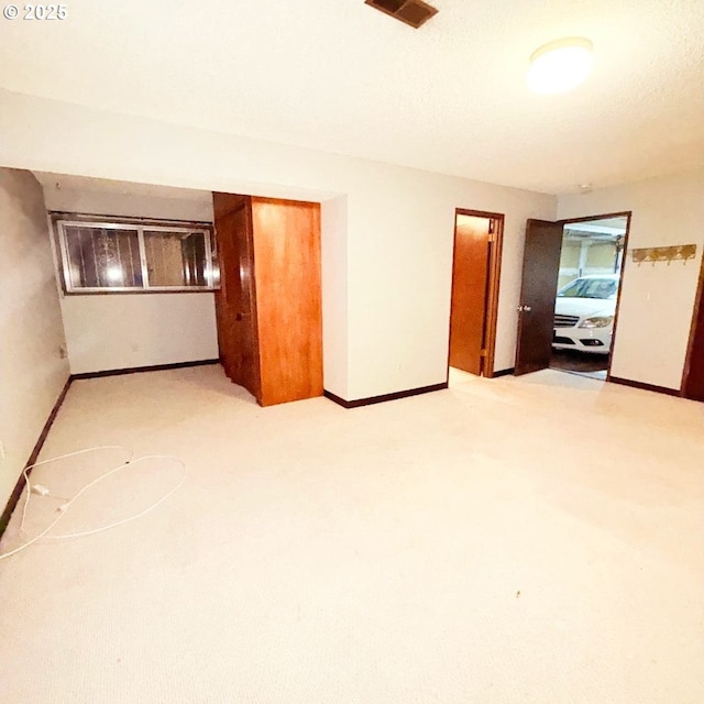 14807 NE Siskiyou Ct, Portland, OR 97230 - empty room with baseboards and light colored carpet