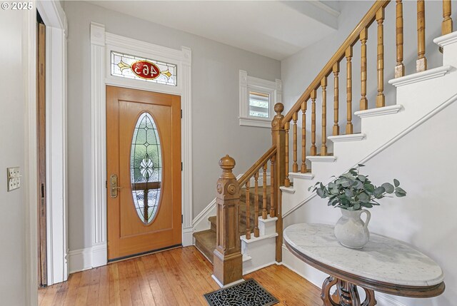 2153 NE Rodney Ave, Portland, OR 97212 - entrance foyer with hardwood / wood-style floors and stairway