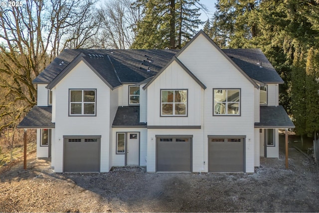 modern farmhouse with a garage