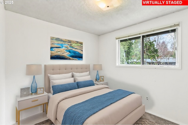 bedroom with a textured ceiling