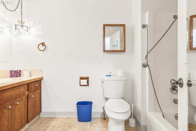 bathroom featuring baseboards, shower / washtub combination, toilet, tile patterned floors, and vanity