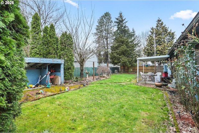 view of yard with a patio and a fenced backyard