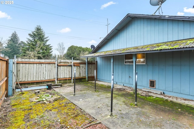 view of property exterior with a fenced backyard