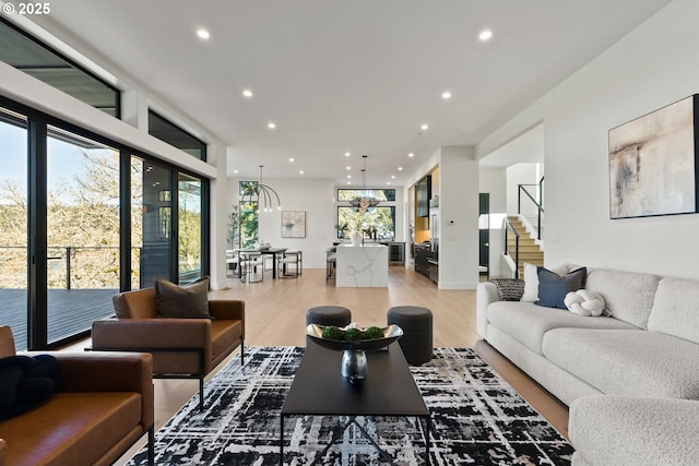 living room featuring a healthy amount of sunlight and hardwood / wood-style floors