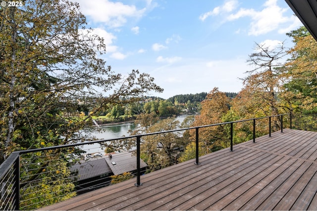 deck featuring a water view