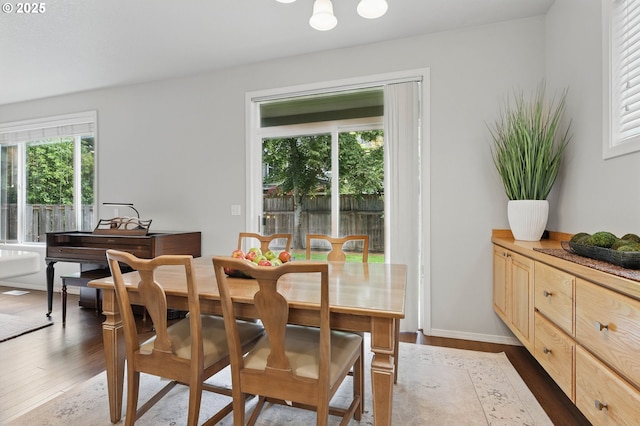 2510 NW Rogue Valley Ter, Beaverton, OR 97006 - dining space with dark wood-style flooring