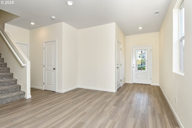 foyer entrance featuring light hardwood / wood-style flooring