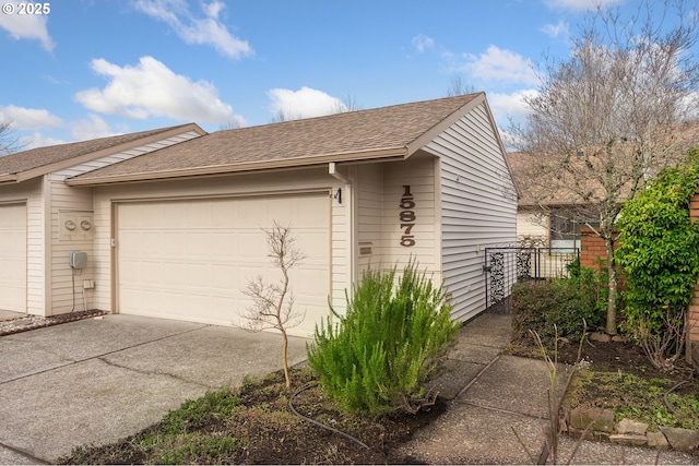 view of property exterior with a garage