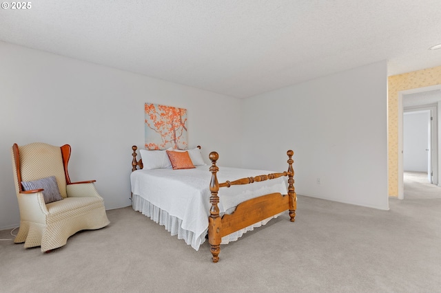 carpeted bedroom with a textured ceiling