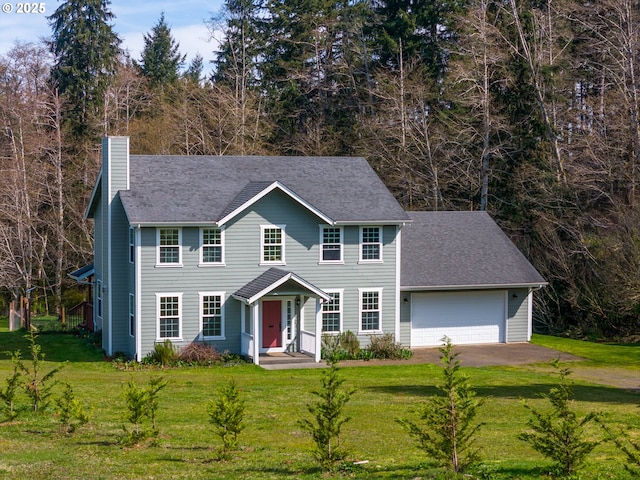 92041 Carmen Creek Rd, Astoria, OR 97103 - colonial house with a chimney, a front lawn, and a garage