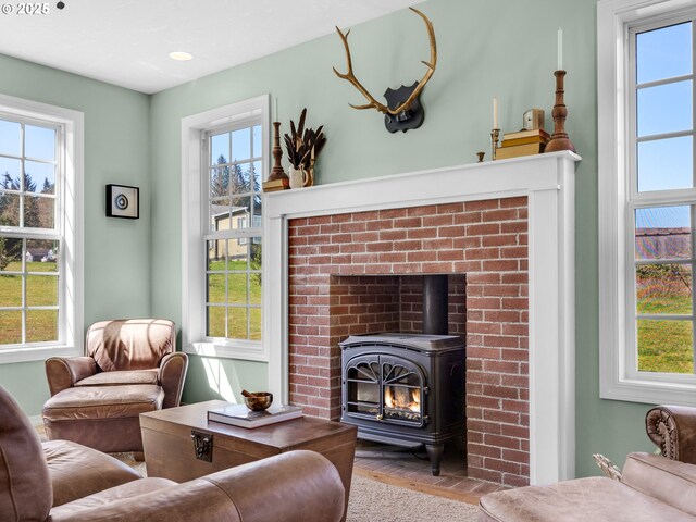 92041 Carmen Creek Rd, Astoria, OR 97103 - living room featuring a wood stove and recessed lighting