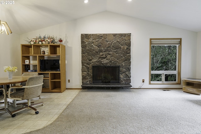 tiled living room featuring a fireplace, visible vents, vaulted ceiling, carpet floors, and baseboards