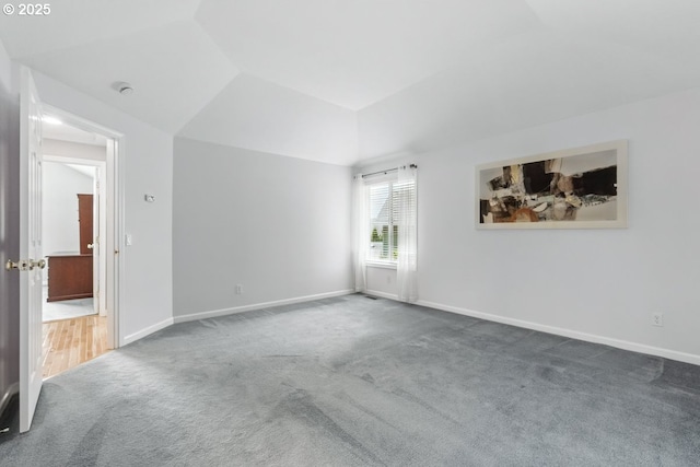 16485 SW Viking Ct, Beaverton, OR 97007 - empty room with carpet floors, lofted ceiling, and baseboards