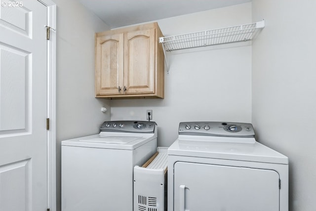 16485 SW Viking Ct, Beaverton, OR 97007 - laundry room with cabinet space and washing machine and dryer