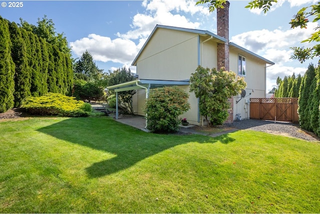 16485 SW Viking Ct, Beaverton, OR 97007 - back of property featuring a chimney and a gate