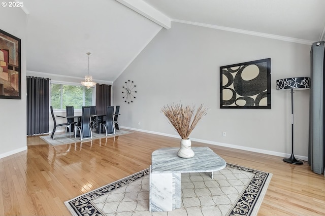 16485 SW Viking Ct, Beaverton, OR 97007 - dining area with wood finished floors, a chandelier, baseboards, and ornamental molding