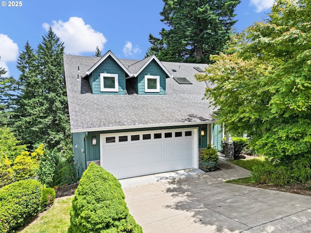 3335 Bentley Ave, Eugene, OR 97405 - view of front of property featuring concrete driveway, board and batten siding, an attached garage, and a shingled roof