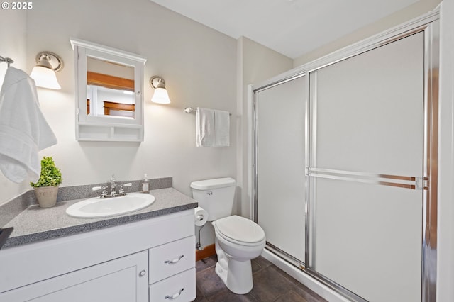 1635 SW 14th St, Warrenton, OR 97146 - bathroom featuring vanity, a shower stall, and toilet