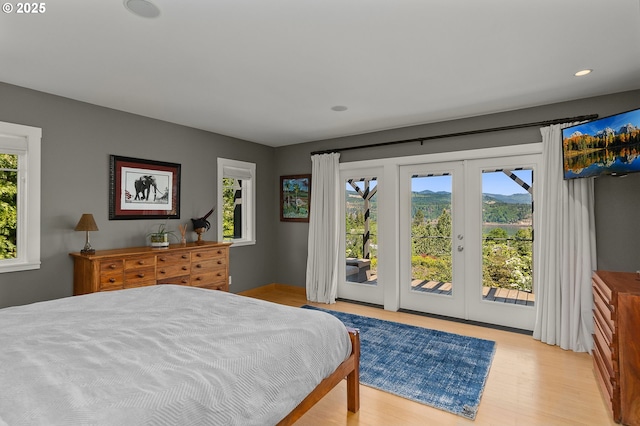 1524 Sherman Ave, Hood River, OR 97031 - bedroom with access to outside, light wood-style floors, recessed lighting, and baseboards