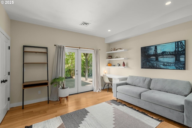 1524 Sherman Ave, Hood River, OR 97031 - living area featuring french doors, wood finished floors, and recessed lighting