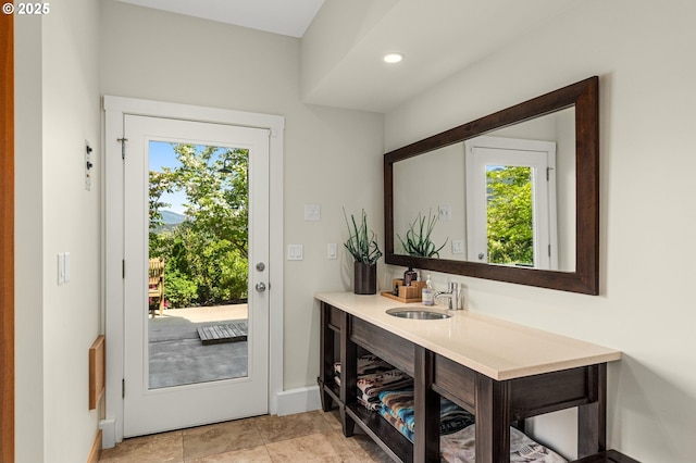 1524 Sherman Ave, Hood River, OR 97031 - doorway to outside featuring a sink, healthy amount of natural light, and baseboards