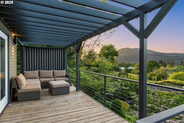 1524 Sherman Ave, Hood River, OR 97031 - deck at dusk with a pergola, a mountain view, and outdoor lounge area
