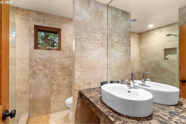 1524 Sherman Ave, Hood River, OR 97031 - bathroom featuring tile walls, toilet, a sink, and tile patterned floors