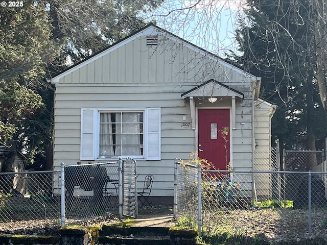 view of front of house with fence