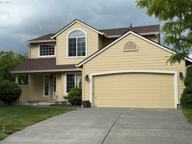 2113 SE 181st Ave, Vancouver, WA 98683 - traditional-style house featuring driveway, an attached garage, a shingled roof, and a front lawn