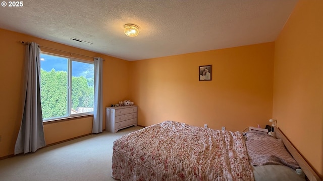 2113 SE 181st Ave, Vancouver, WA 98683 - bedroom with light carpet, a textured ceiling, and baseboards