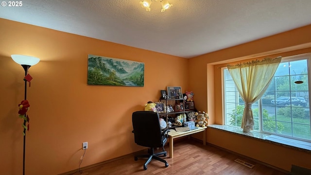 2113 SE 181st Ave, Vancouver, WA 98683 - office space featuring light wood-style floors, baseboards, and a textured ceiling