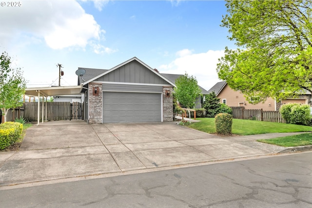 single story home featuring board and batten siding, an attached garage, fence, and a front yard