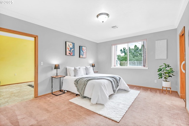 bedroom featuring crown molding, baseboards, light carpet, and visible vents
