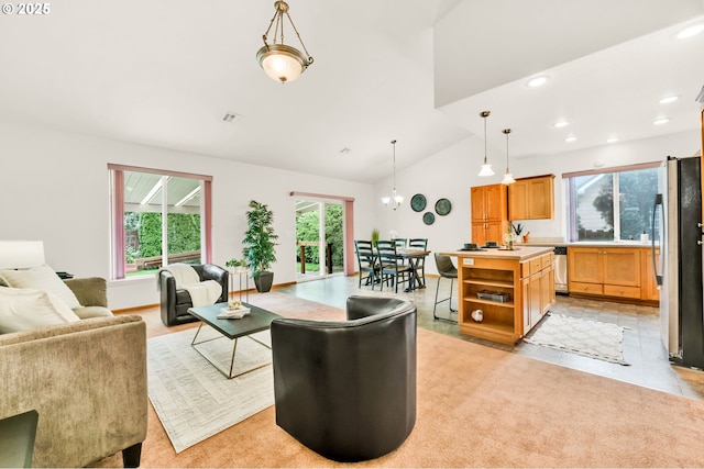 living area featuring recessed lighting, baseboards, vaulted ceiling, and visible vents