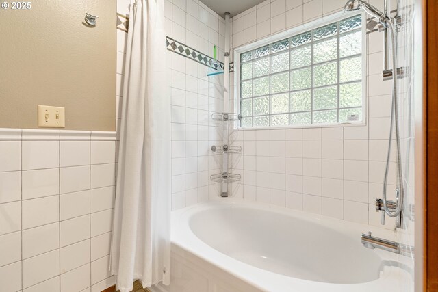 4740 SW Lowell Ct, Portland, OR 97221 - bathroom with shower / bath combo, tile walls, and a wainscoted wall